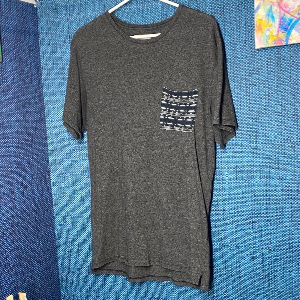 On the Byas Gray Tee with Blue Pattern Pocket